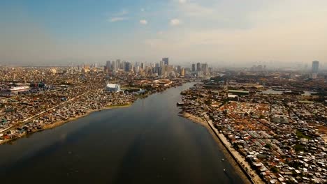 Antena-ciudad-con-rascacielos-y-edificios.-Filipinas,-Manila,-Makati