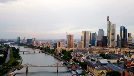 aerial-view-of--Frankfurt-city-with-river-and-skyscrapers-during-sunrise