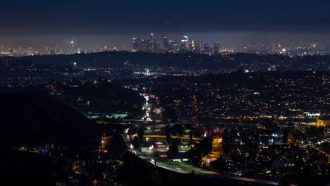 Downtown-Los-Angeles-and-Freeway-4th-of-July-Fireworks-Night-Timelapse