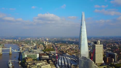 Beautiful-aerial-view-of-London,-Tower-bridge-and-the-Shard-skyscraper-from-above.
