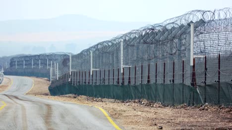 Border-of-Syria-and-Israel.-Tall-fences-with-military-posts-and-UN-soldiers