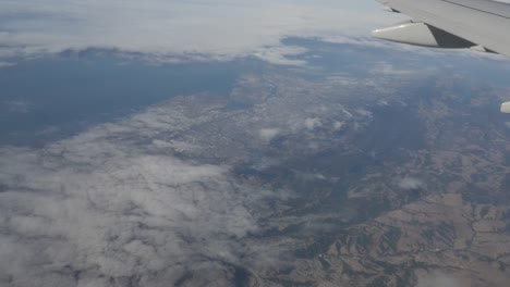 Aerial-view-of-San-Francisco-and-Oakland-Suburbs-out-of-plane-window-4k
