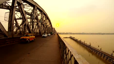 Nivedita-cable-stayed-bridge-old-cars-cart-drive-sunset-pier-on-river-pink-light-near-Kali-temple-Ramakrishna-mission