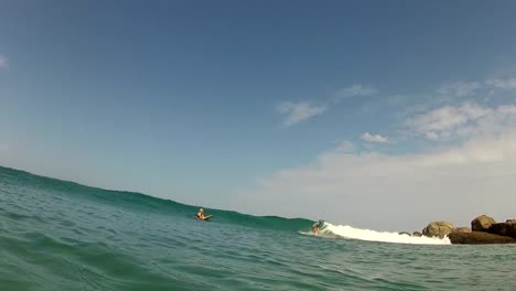 Young-woman-surfing-big-waves