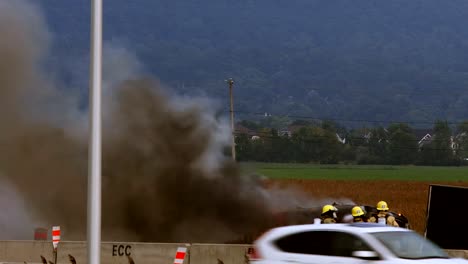 Pick-up-Truck-on-fire-on-the-Highway-near-Montreal,-Quebec,-Canada