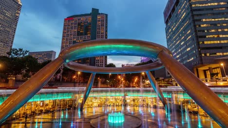 Sonnenuntergang-Himmel-Brunnen-des-Reichtums-4-k-Zeit-hinfällig-aus-Singapur