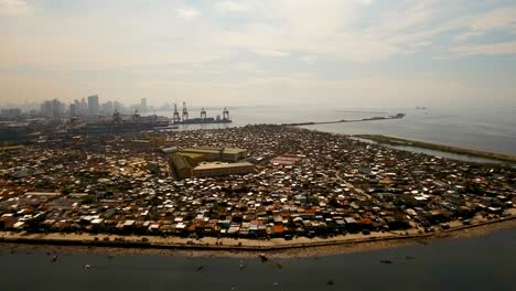 Barrios-de-Manila,-el-barrio-pobre-en-vista-aérea.-Filipinas,-Manila