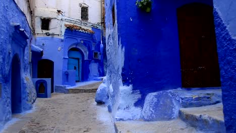 POV,-walking-in-blue-town-Chefchaouen-Chaouen-/-Morocco,-first-point-of-view