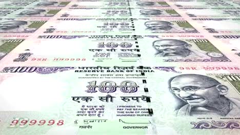 Banknotes-of-one-hundred-indian-rupees-of-India-rolling,-cash-money,-loop