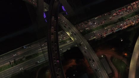 Aerial-View-of-Marginal-Pinheiros-and-Estaiada-Bridge-at-night-in-Sao-Paulo,-Brazil