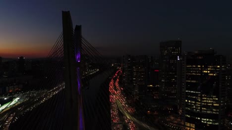 Aerial-View-of-Marginal-Pinheiros-and-Estaiada-Bridge-at-night-in-Sao-Paulo,-Brazil