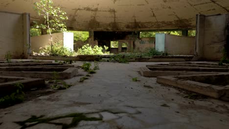 Walking-in-the-abandoned-building-in-Tskaltubo,-Georgia