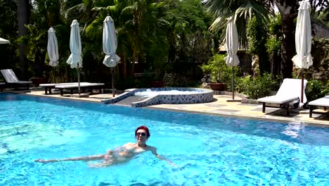 Woman-swims-in-the-pool