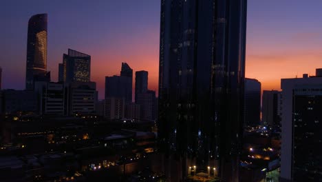 Beautiful-magical-sunset-with-the-moon-in-Abu-Dhabi-city,-United-Arab-Emirates