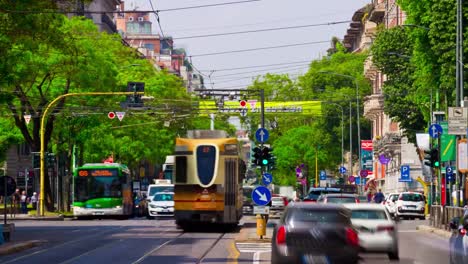 Italy-milan-city-sunny-day-tram-traffic-street-panorama-4k-timelapse