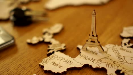 The-camera-gradually-focuses-on-the-wooden-model-of-the-map-of-Europe.-Model-of-wood-Eiffel-Tower.-Attractions-in-Paris,-France