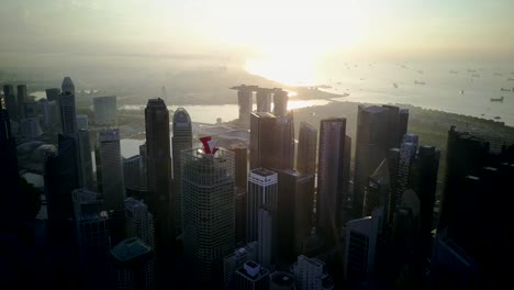 Beautiful-morning-drone-footage-of-Singapore-urban-skyline-at-central-business-district-with-marina-bay-background.