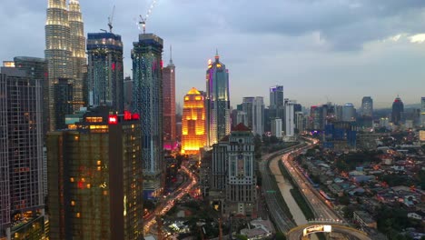 evening-illumination-kuala-lumpur-downtown-traffic-road-aerial-panorama-4k-malaysia