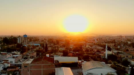 Flight-above-Muslim-town-with-mosque-minaret-and-residential-buildings.