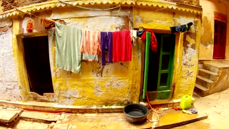 Slums-of-Benares-things-dry-over-tacky-enterance-to-house