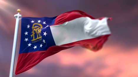 Flagge-des-amerikanischen-Staates-Georgia,-Region-der-Vereinigten-Staaten,-bei-Sonnenuntergang-Schleife