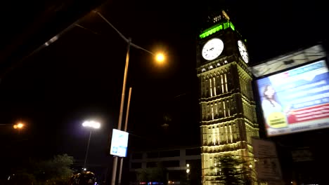 Big-Ben-of-Kolkata,-Lake-Town-Clock-Tower-at-night-through-car-window