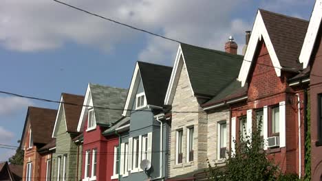 Row-of-homes.-Timelapse-clouds.