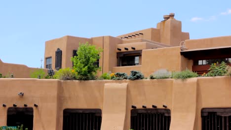 Establishing-shot-of-a-lavish-adobe-holiday-villa-with-a-rooftop-garden.