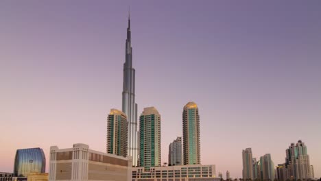 puesta-de-sol-luz-dubai-ciudad-mundial-más-alto-edificio-del-hotel-panorama-4-tiempo-k-lapso-Emiratos-Árabes-Unidos