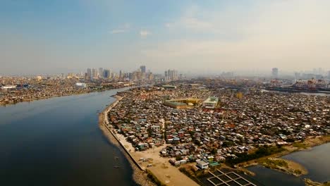 Luftbild-Stadt-mit-Wolkenkratzern-und-Gebäuden.-Philippinen,-Manila,-Makati