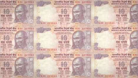 Banknotes-of-ten-indian-rupees-of-India-rolling,-cash-money,-loop