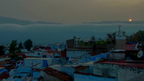 Schöner-Sonnenuntergang-Zeitraffer-über-afrikanische-blaue-Stadt-Chefchaouen-in-Marokko,-Chaouen