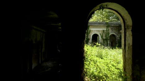 Walking-in-the-abandoned-building-in-Tskaltubo,-Georgia