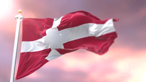 Denmark-flag-waving-at-wind-at-sunset,-loop