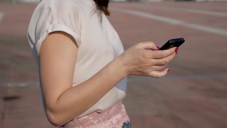 young-woman-drops-her-phone-while-typing