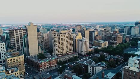 Aerial-footage-of-Montreal-during-a-hazy-summer-day