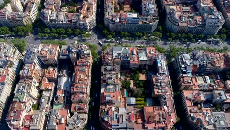 Aerial-high-angle-shot-of-Barcelona-street-and-block-buildings,-urban-area