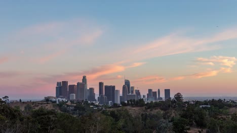 Centro-de-Los-Ángeles-horizonte-día-a-la-noche-rosada-puesta-de-sol-todo-el-lapso-de-tiempo