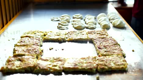 Food-Vendor-frying-Martabak-Aceh-at-street-market