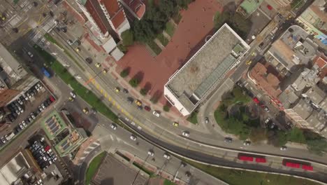 Top-down-aerial-of-downtown-Bogota-traffic-and-office-buildings