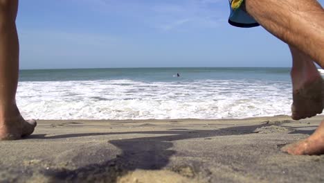 SLOW-MOTION:-Young-couple-running-into-the-sea