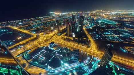 Centro-de-la-ciudad-ciudad-de-Dubái-noche-iluminación-techo-panorama-superior-4-tiempo-k-lapso-Emiratos-Árabes-Unidos