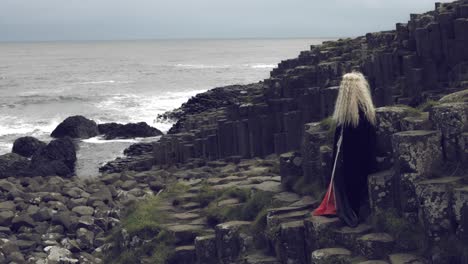 4k-Fantasy-Shot-on-Giant's-Causeway-of-a-Queen-Showing-at-the-Ocean