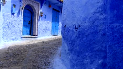 POV,-walking-in-blue-town-Chefchaouen-Chaouen-/-Morocco,-first-point-of-view