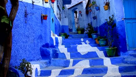 POV,-walking-in-blue-town-Chefchaouen-Chaouen-/-Morocco,-first-point-of-view