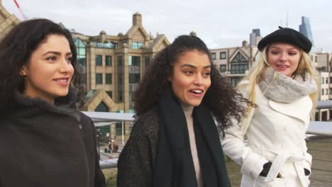 Group-Of-Young-Female-Friends-Visiting-London-In-Winter