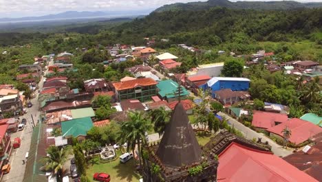 Spanish-architecture-of-16th-Century-Saint-Gregory-the-Great-Parish-Church-Tower-at-the-foot-of-Mt.-Banahaw.-Drone-aerial-shot