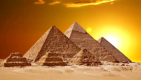 Timelapse-Of-The-Great-Pyramids-In-Giza-Valley,-Cairo,-Egypt.-Sunset-over-the-pyramids.