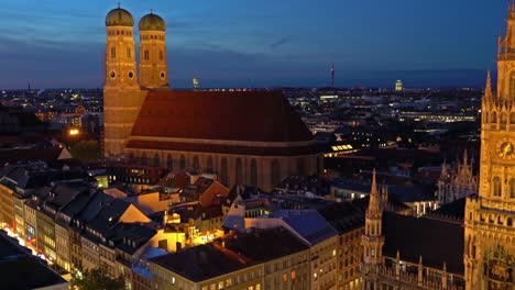 Aerial-view-of-Frauenkirche-at-night,-Munich,-Bavaria,-Germany