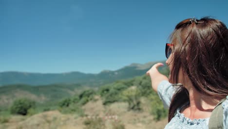 POV-shot-happy-smiling-young-woman-in-sunglasses-taking-selfie-outdoor